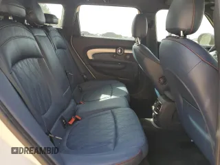 2016 MINI Clubman z VIN WMWLN5C50G2E29737, wystawiony jako Copart lot #50459135 z przebiegiem 129 940 mil mil oraz Szkody całkowita. Historia ofert i sprzedaży dostępna na DreamBid. Obrazek 11.