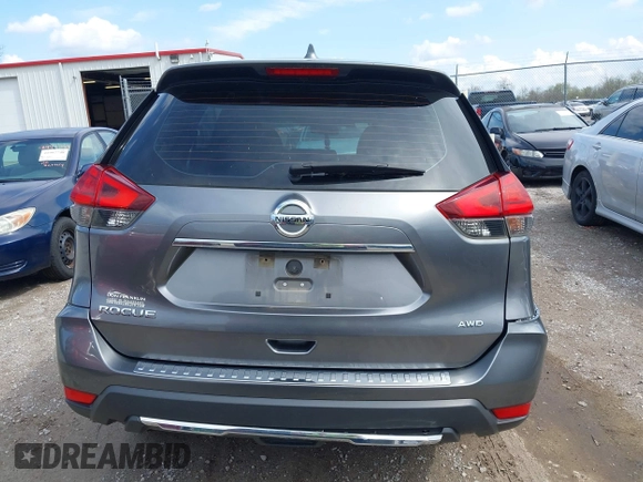 2017 Nissan Rogue SV with VIN KNMAT2MV5HP560371, listed as a IAAI auction lot 41982569 with 145,327 mi miles and . Bid and sale history available at carsss.com. Image 16.