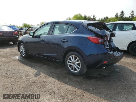 2016 Mazda 3 i Touring with VIN 3MZBM1L74GM318638, listed as a Copart auction lot 59168915 with 88,947 mi miles and Salvage title. Bid and sale history available at DreamBid. Image 2.