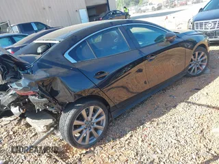 2024 Mazda 3 S Preferred z VIN 3MZBPACM7RM403246, wystawiony jako IAAI lot #42179543 z przebiegiem 19 279 mil mil oraz . Historia ofert i sprzedaży dostępna na DreamBid. Obrazek 4.