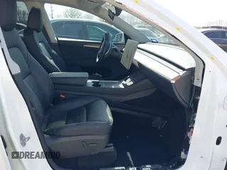 2024 Tesla Model Y with VIN 7SAYGDEDXRA300743, listed as a IAAI auction lot 41690374 with 12,446 mi miles and . Bid and sale history available at DreamBid. Image 5.