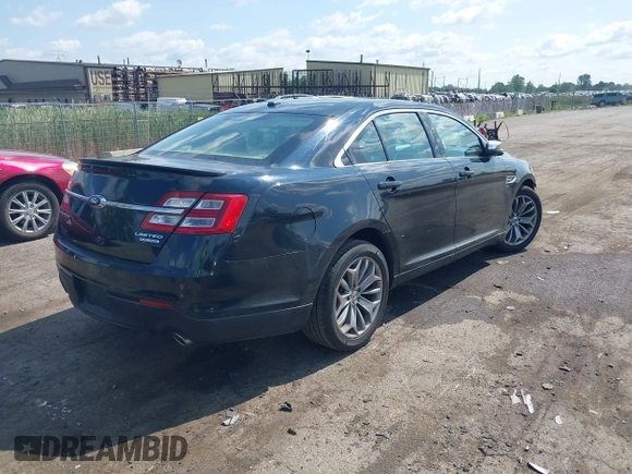 2014 Ford Taurus Limited z VIN 1FAHP2F85EG125118, wystawiony jako IAAI lot #42457437 z przebiegiem 129 406 mil mil oraz . Historia ofert i sprzedaży dostępna na DreamBid. Obrazek 4.