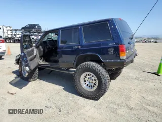 2000 Jeep Cherokee with VIN 1J4FF48S3YL126931, listed as a Copart auction lot 57593305 with Not provided miles and Non repairable. Bid and sale history available at DreamBid. Image 2.