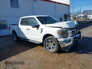 2023 Ford F-150 XL with VIN 1FTFW1E8XPFA58413, listed as a IAAI auction lot 40633171 with 92,438 mi miles. Bid and sale history available at carsss.com. Image 1.