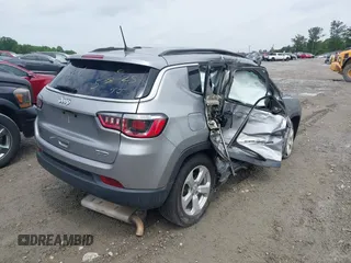 2019 Jeep Compass Latitude with VIN 3C4NJCBB3KT851086, listed as a IAAI auction lot 42248059 with 149,351 mi miles and . Bid and sale history available at DreamBid. Image 4.