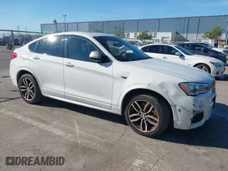 2017 BMW X4 M40i with VIN 5UXXW7C59H0U25191, listed as a IAAI auction lot 41867852 with 76,301 mi miles. Bid and sale history available at carsss.com. Image 1.