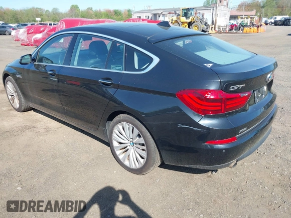 2014 BMW 5 Series GT 535i Gran Turismo xDrive with VIN WBA5M4C56ED183815, listed as a IAAI auction lot 42155348 with 150,357 mi miles and . Bid and sale history available at carsss.com. Image 3.