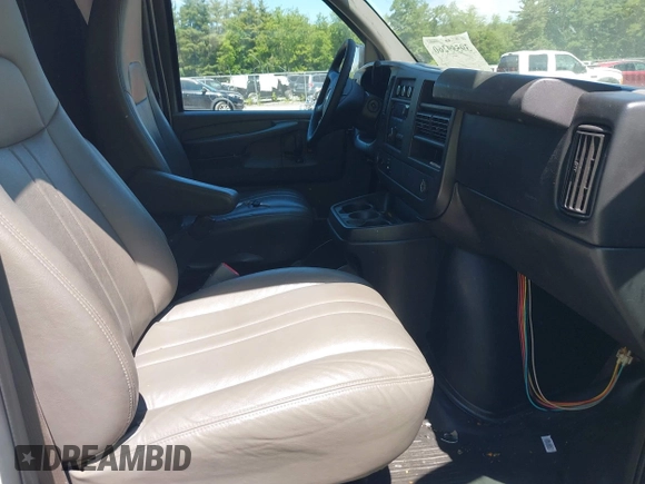 2014 Chevrolet Express Cargo Van with VIN 1GCWGFCA2E1210307, listed as a IAAI auction lot 39559260 with 213,814 mi miles. Bid and sale history available at carsss.com. Image 5.