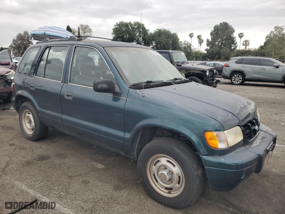2001 Kia Sportage with VIN KNDJB723615696057, listed as a Copart auction lot 53584345 with 107,965 mi miles and Clean Title. Bid and sale history available at carsss.com. Image 4.