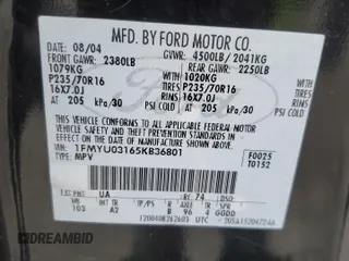 2005 Ford Escape XLT with VIN 1FMYU03165KB36801, listed as a Copart auction lot 61978705 with 217,658 mi miles and Salvage title. Bid and sale history available at DreamBid. Image 14.
