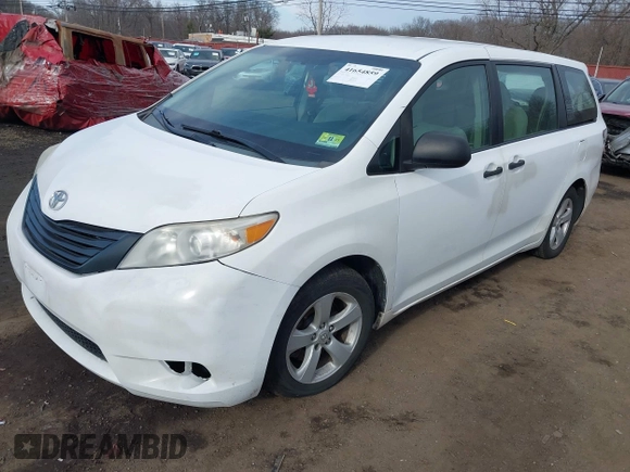 2011 Toyota Sienna with VIN 5TDZK3DC3BS058823, listed as a IAAI auction lot 41654859 with 227,969 mi miles. Bid and sale history available at carsss.com. Image 2.