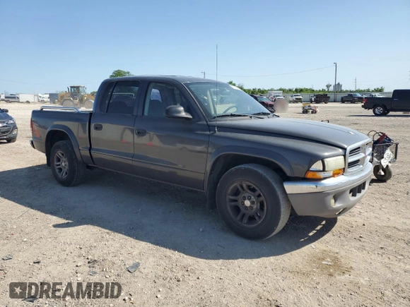 2003 Dodge Dakota SLT with VIN 1D7HL48X03S114761, listed as a Copart auction lot 52323405 with 137,105 mi miles and Salvage Title. Bid and sale history available at carsss.com. Image 4.
