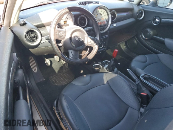 2011 MINI Hardtop S with VIN WMWSV3C5XBTY24525, listed as a Copart auction lot 49977475 with 110,627 mi miles and Salvage title. Bid and sale history available at DreamBid. Image 8.