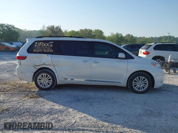 2015 Toyota Sienna XLE with VIN 5TDYK3DC5FS534913, listed as a IAAI auction lot 42052427 with 105,046 mi miles. Bid and sale history available at carsss.com. Image 13.
