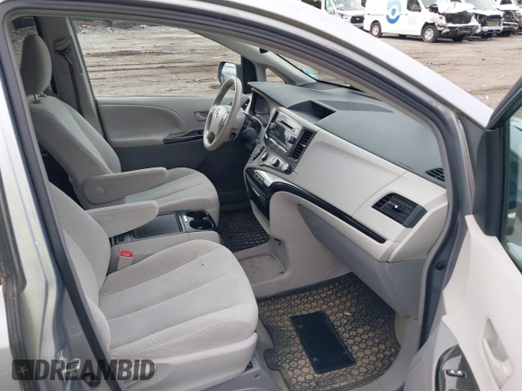 2012 Toyota Sienna LE AAS with VIN 5TDKK3DC7CS196531, listed as a IAAI auction lot 42279383 with 121,633 mi miles and . Bid and sale history available at DreamBid. Image 5.