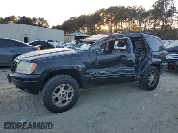 1999 Jeep Grand Cherokee Limited with VIN 1J4GW68S7XC676809, listed as a Copart auction lot 79059944 with 196,391 mi miles and Salvage Title. Bid and sale history available at carsss.com. Image 1.