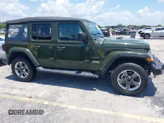 2022 Jeep Wrangler Unlimited Sahara z VIN 1C4HJXEN3NW242458, wystawiony jako IAAI lot #42352073 z przebiegiem 26 154 mil mil oraz . Historia ofert i sprzedaży dostępna na DreamBid. Obrazek 13.