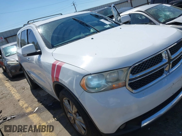 2013 Dodge Durango Crew with VIN 1C4RDHDG8DC698668, listed as a IAAI auction lot 41876841 with 160,012 mi miles and . Bid and sale history available at DreamBid. Image 1.