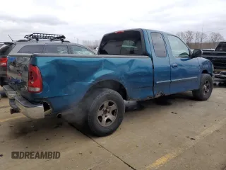 2000 Ford F-150 XL with VIN 1FTRX17W5YNA58235, listed as a Copart auction lot 84026504 with 0 mi miles and Salvage Title. Bid and sale history available at carsss.com. Image 3.