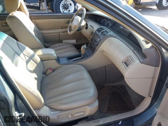 2002 Toyota Avalon XL with VIN 4T1BF28B02U262066, listed as a IAAI auction lot 41896384 with 184,646 mi miles and . Bid and sale history available at DreamBid. Image 5.