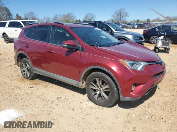 2018 Toyota RAV4 XLE with VIN 2T3WFREV6JW434177, listed as a Copart auction lot 50184895 with 160,942 mi miles and Salvage Title. Bid and sale history available at DreamBid. Image 4.