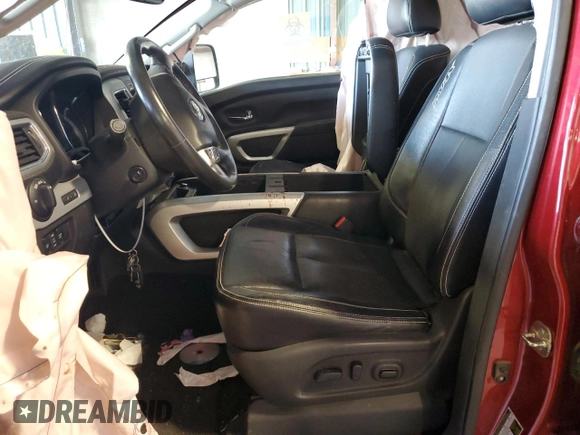 2017 Nissan Titan Platinum Reserve with VIN 1N6AA1E52HN501110, listed as a Copart auction lot 48202935 with 83,674 mi miles and Salvage title. Bid and sale history available at DreamBid. Image 7.