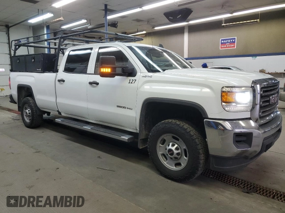 2018 GMC Sierra 2500HD z VIN 1GT12REG7JF264498, wystawiony jako Copart lot #82891494 z przebiegiem 206 152 mil mil oraz Szkoda całkowita • Salvage title. Historia ofert i sprzedaży dostępna na DreamBid. Obrazek 4.