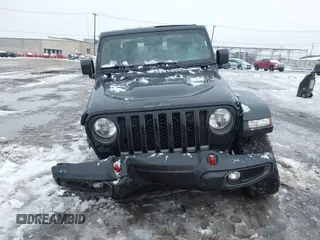 2021 Jeep Gladiator Rubicon z VIN 1C6JJTBG5ML605799, wystawiony jako IAAI lot #41190679 z przebiegiem 47 550 mil mil oraz . Historia ofert i sprzedaży dostępna na DreamBid. Obrazek 6.