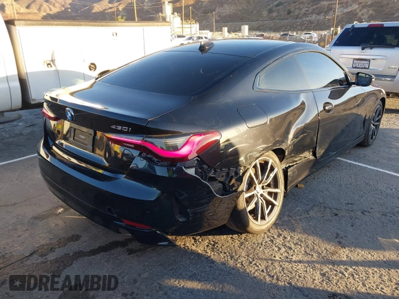 2022 BMW 4 Series 430i xDrive with VIN WBA73AP00NCJ16822, listed as a IAAI auction lot 41329235 with 30,570 mi miles and . Bid and sale history available at DreamBid. Image 4.