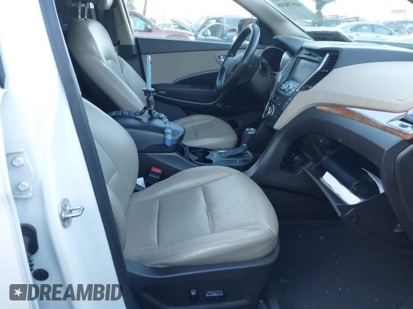 2014 Hyundai Santa Fe with VIN 5XYZUDLB4EG129473, listed as a IAAI auction lot 40978108 with 169,997 mi miles and . Bid and sale history available at DreamBid. Image 5.