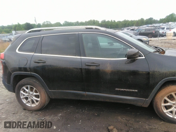 2014 Jeep Cherokee Latitude with VIN 1C4PJLCB1EW231178, listed as a IAAI auction lot 42128894 with 121,412 mi miles. Bid and sale history available at carsss.com. Image 13.