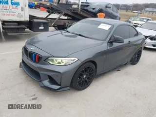 2014 BMW 2 Series M235i with VIN WBA1J7C57EVW84554, listed as a IAAI auction lot 41564175 with 121,632 mi miles and . Bid and sale history available at carsss.com. Image 2.