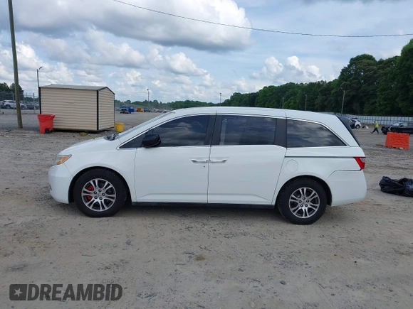2011 Honda Odyssey EX-L with VIN 5FNRL5H67BB011070, listed as a IAAI auction lot 42491685 with 200,671 mi miles and . Bid and sale history available at DreamBid. Image 14.