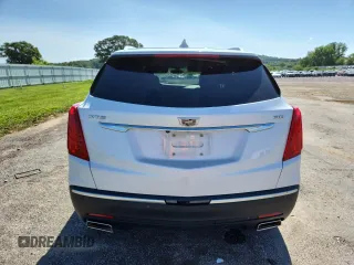 2017 Cadillac XT5 FWD z VIN 1GYKNARS2HZ173122, wystawiony jako Copart lot #63027715 z przebiegiem 130 467 mil mil oraz Czysty tytuł • Clean title. Historia ofert i sprzedaży dostępna na DreamBid. Obrazek 6.