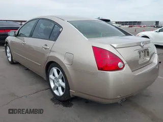 2004 Nissan Maxima SE with VIN 1N4BA41EX4C927086, listed as a IAAI auction lot 41734539 with 135,331 mi miles and . Bid and sale history available at DreamBid. Image 3.