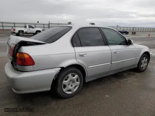 1999 Honda Civic EX with VIN 2HGEJ8642XH535558, listed as a Copart auction lot 45024675 with 148,808 mi miles and Salvage Title. Bid and sale history available at carsss.com. Image 3.