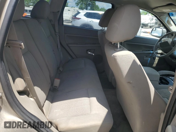 2005 Jeep Grand Cherokee Laredo with VIN 1J4HR48N65C608296, listed as a Copart auction lot 58862875 with 168,421 mi miles and Salvage title. Bid and sale history available at DreamBid. Image 11.