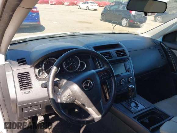 2015 Mazda CX-9 Touring with VIN JM3TB3CV1F0461403, listed as a IAAI auction lot 42148325 with 143,452 mi miles. Bid and sale history available at carsss.com. Image 17.