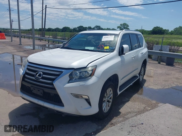 2015 Lexus GX 460 with VIN JTJBM7FX7F5116959, listed as a IAAI auction lot 42085273 with 249,402 mi miles and . Bid and sale history available at carsss.com. Image 2.