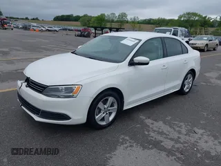2014 Volkswagen Jetta TDI w/Premium with VIN 3VWLL7AJXEM372547, listed as a IAAI auction lot 42320105 with 113,200 mi miles and . Bid and sale history available at DreamBid. Image 2.