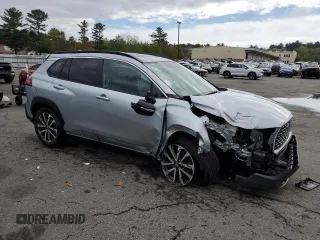 2022 Toyota Corolla Cross XLE with VIN 7MUDAABG2NV009663, listed as a Copart auction lot 55945735 with 59,473 mi miles and Salvage title. Bid and sale history available at DreamBid. Image 4.