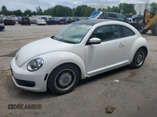 2013 Volkswagen Beetle 2.5L w/Sun with VIN 3VWJP7AT4DM652914, listed as a Copart auction lot 59940805 with 62,947 mi miles and Salvage title. Bid and sale history available at DreamBid. Image 1.