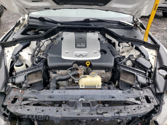 2015 Infiniti Q50 Premium z VIN JN1BV7AR9FM396109, wystawiony jako Copart lot #58215035 z przebiegiem 134 482 mil mil oraz Szkody całkowita. Historia ofert i sprzedaży dostępna na DreamBid. Obrazek 11.