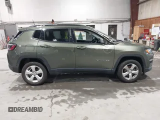 2021 Jeep Compass Latitude with VIN 3C4NJDBB1MT566220, listed as a IAAI auction lot 41816107 with 69,139 mi miles and . Bid and sale history available at DreamBid. Image 13.