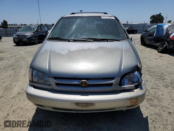 1998 Toyota Sienna LE with VIN 4T3ZF13C4WU064791, listed as a Copart auction lot 61411865 with 218,835 mi miles and Salvage title. Bid and sale history available at DreamBid. Image 5.