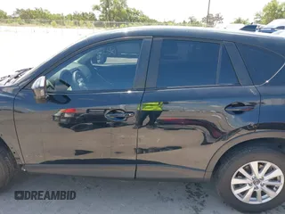 2014 Mazda CX-5 Sport with VIN JM3KE2BE9E0402015, listed as a IAAI auction lot 42098197 with 65,328 mi miles and . Bid and sale history available at carsss.com. Image 15.
