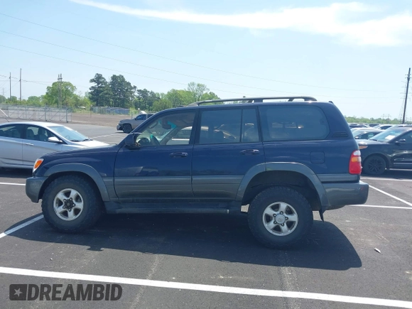 2000 Toyota Land Cruiser with VIN JT3HT05J8Y0123024, listed as a IAAI auction lot 42028792 with 360,074 mi miles. Bid and sale history available at carsss.com. Image 14.