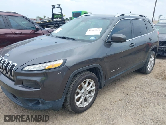 2017 Jeep Cherokee Latitude with VIN 1C4PJLCB1HW574447, listed as a IAAI auction lot 42395204 with 102,985 mi miles and . Bid and sale history available at DreamBid. Image 2.