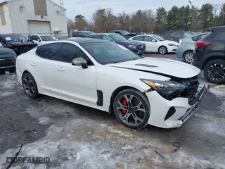 2018 Kia Stinger GT1 with VIN KNAE45LC5J6026943, listed as a IAAI auction lot 41552778 with 59,406 mi miles. Bid and sale history available at carsss.com. Image 1.