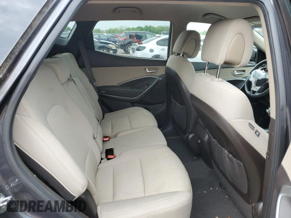 2018 Hyundai Santa Fe 2.4L z VIN 5XYZTDLB4JG553426, wystawiony jako Copart lot #54609875 z przebiegiem 93 328 mil mil oraz Szkoda całkowita • Salvage title. Historia ofert i sprzedaży dostępna na DreamBid. Obrazek 11.